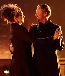 The Master dances with his future incarnation Missy.