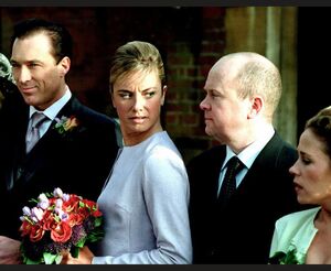 Phil attends the wedding of Steve and Mel (2001).