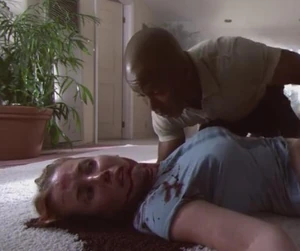 James Doakes comforting Norberto's second victim, Kara Simmons, before she dies.