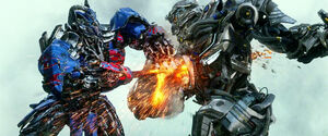Galvatron destroying Optimus' Enegon Swords with the Vortex Grinder.
