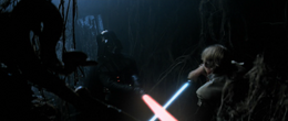 On Dagobah, Luke enters a large hollow underneath a tree and in a dream-like vision duels Darth Vader.