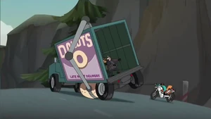 The thugs attempting to free their truck from Perry's grappling hook before their escape.
