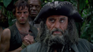 Blackbeard conversing with Jack on their way to the legendary fountain.