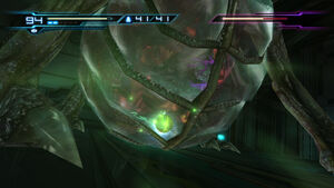 Samus using Power Bombs on the Queen Metroid's stomach, reminiscent of the battle in Metroid II.