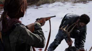 Ellie orders David to carry the deer at gunpoint.