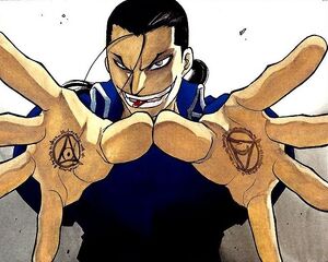 Kimblee in the manga, displaying his alchemic tattoos and his Philosopher's Stone.