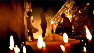 Zé Pequeno being blessed by the witch doctor.