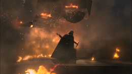 Vader completely unharmed uses the Force to lift both of the walkers off of himself.