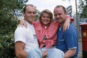 Phil and Grant with their younger sister Sam Mitchell.