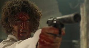 Miguel Bain 9.jpg (87 KB) Bain aiming a gun at Rath's back, moments before his death.