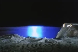 Waller absorbing sustenance from a pool of spring water.