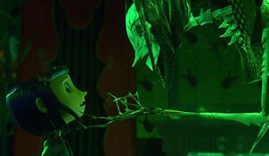 "You know I love you. Hmmmmmm". Coraline: "You have a very funny way of showing it".