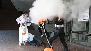 Neon sprays Turbon to protect her father.