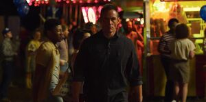 Grigori about to kill Alexei with a silent gun.