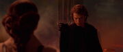 Anakin fully transformed into Vader Force-choking his wife