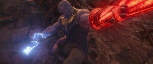 Thanos having both of his arms restrained.