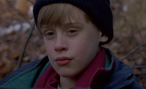 Henry looking at a dog that he had murdered.