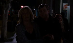 The Replicator walks Strauss to a bench.