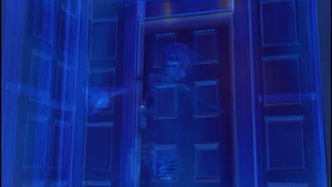 Clark Kent using his X-ray vision to see an invisible Jeff.