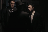 Lenny Cole under his pseudonym Sydney Shaw while he is selling his men to the authorities.