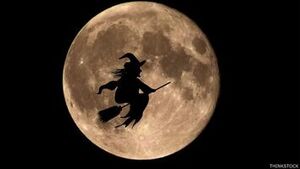 A typical beldam/witch flying on a broomstick in front of the moon.