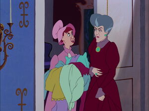 After Cinderella hands her a pile of clothes, Anastasia begins to complain to her mother.