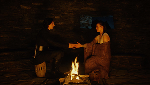 Kylo and Rey touching hands through their Force-bond.