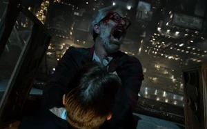 HitmanTorture.png (621 KB) Gordon interrogates the hitman by holding him out of the window.