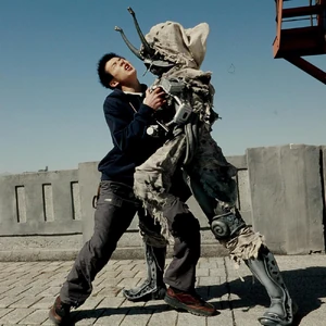 Snail Orphnoch beating up Keitaro.