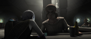 Ventress begins to drown her sorrows in alcohol.