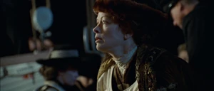Titanic-movie-screencaps.com-13983.jpg (195 KB) Ruth realizing Rose is about to leave her to save Jack.