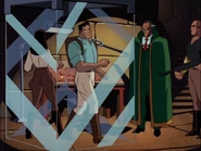 Ubu and his master trapping Bruce and Talia