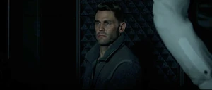 Caine's angry and evil stare as he keeps an eye on Marshall.