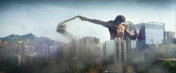 Skar King using his Whipslash to lasso and tear the top off a building to throw at Kong during their final battle in Rio de Janeiro.