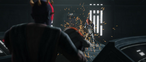 Maul deflects blaster bolts using a 332nd helmet as a shield.