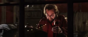 Sakharine piloting a crane in the film's climax.