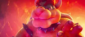 Bowser signals Kamek to stop torturing Toad.