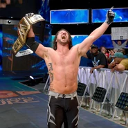 Styles winning the WWE World Championship for the first time.