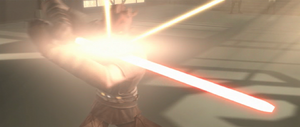 Maul blocks blaster bolts.