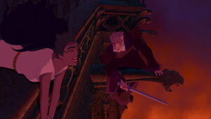 Frollo climbs onto the gargoyle as he attempts to murder Esmeralda.