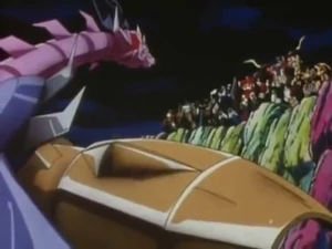 Unicron looks up at Big Convoy and his Maximals after he defeated Magmatron.