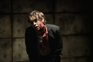 Sebastian as a Walker, chained up in a prison cell.