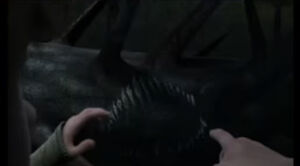 Hiccup and Fishlegs discover a Night Fury bite mark on Toothless's nemesis.