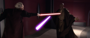 The Sith Lord points his blade directly at Windu's heart.