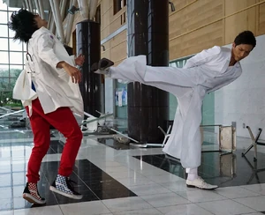 Kazuhige Ryuzaki 3.jpg (314 KB) Kazuhige kicking Emu Hojo.