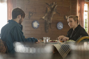 Villanelle and Pyotr having lunch, discussing about their mother.