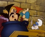Balthazar ready to turn Baby Smurf into baby powder.