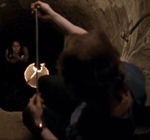 Bill placing the basket down for Catherine.