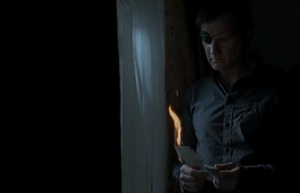 GovernorBurnsPast.png (240 KB) The Governor burning the photo of his family.