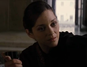 Talia with the bomb trigger.